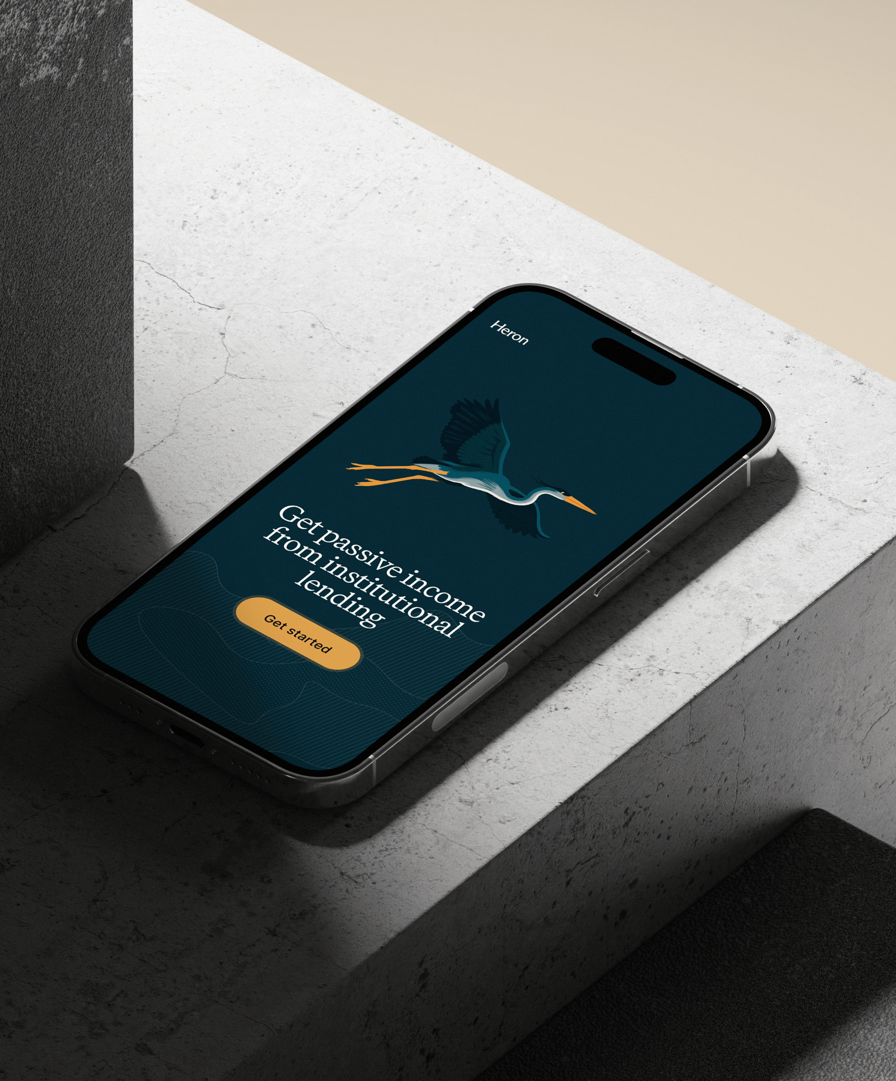 iPhone mock up with Heron's marketing website first scroll.