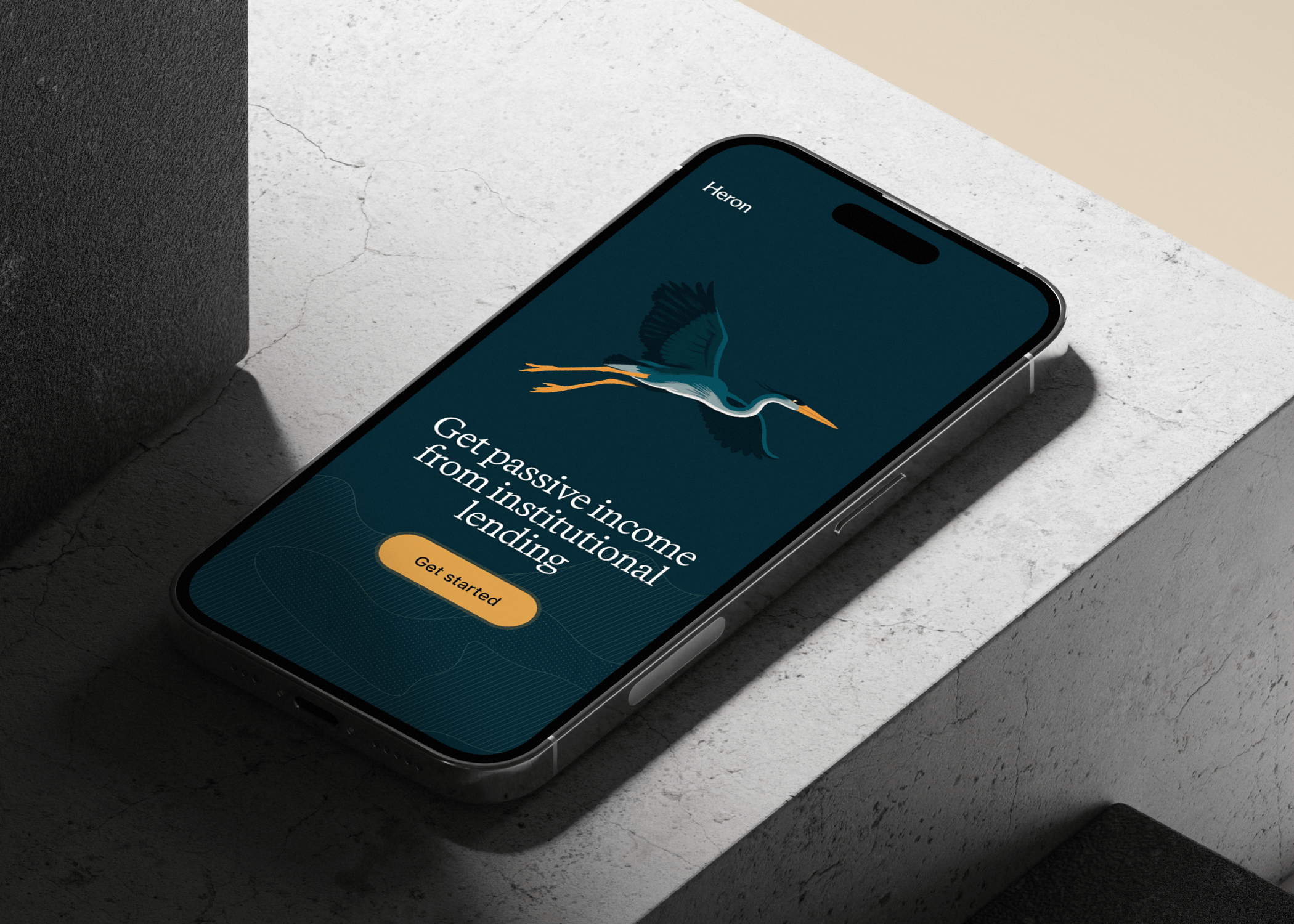 iPhone mock up with Heron's marketing website first scroll.